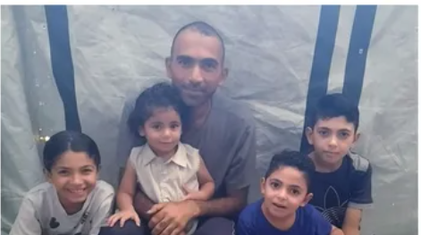 Gaza teacher displaced family campaign Gaza teacher Yousef Siyam and his displaced family living in a tent.