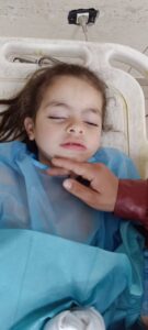 Marah Abu Zaina’s daughter after surgery; urgent need to feed children in Gaza.
