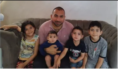 Gaza teacher Yousef Siyam and his displaced family living in a tent