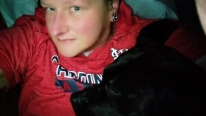 Lisa with her dog Raven, fighting to stay housed